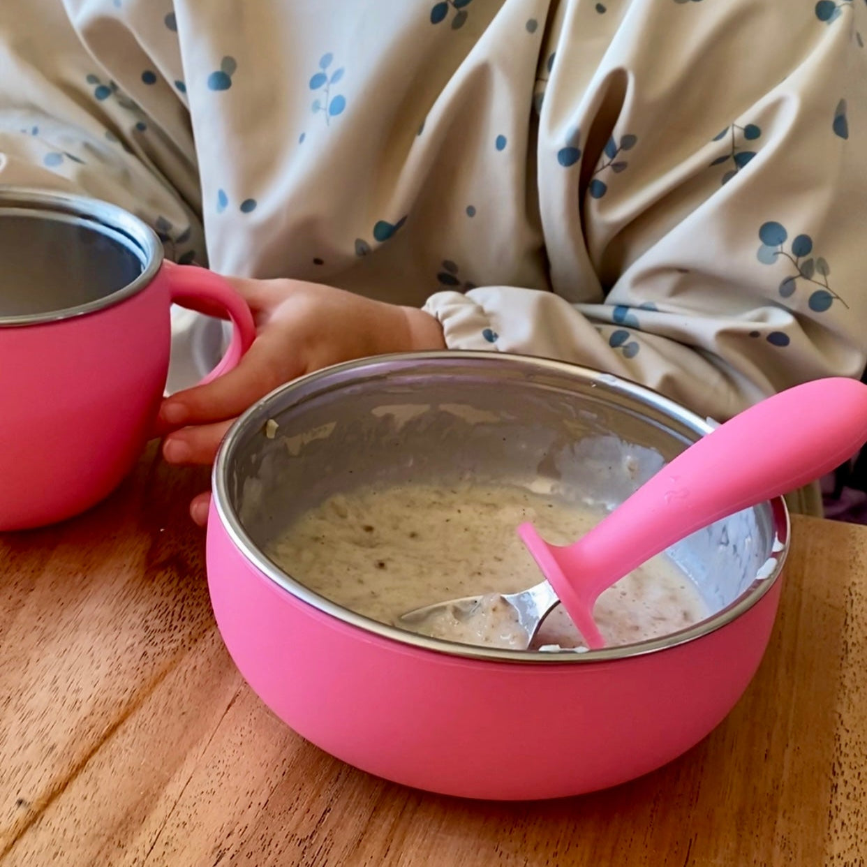 Stainless steel toddler bowl with removable food-grade silicone sleeve, safe & durable pink toddler use