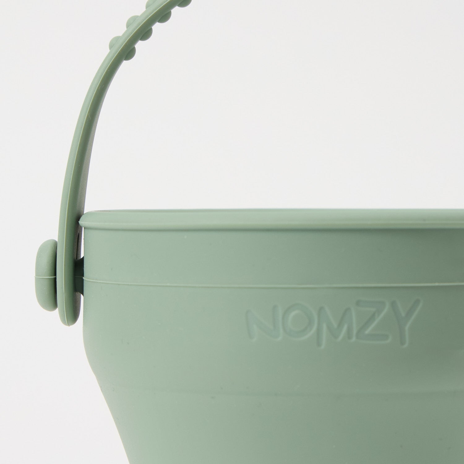 Foldable toddler snack cup made from food-grade silicone, close up